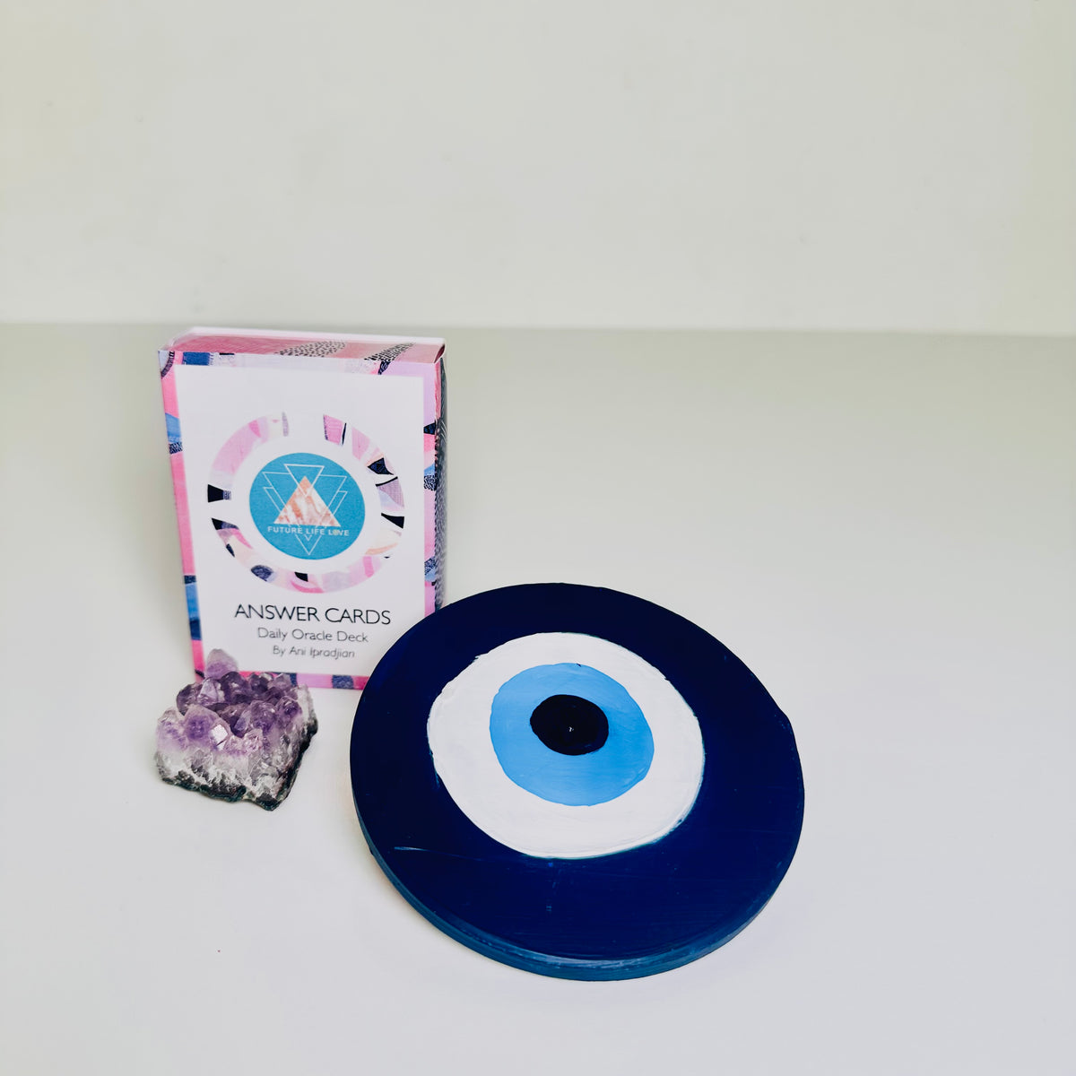 Achk Divine Guardian Number Two blue ceramic evil eye wall art by Ani Ipradjian, a spiritual protection amulet representing resilience, peace and positive energy.