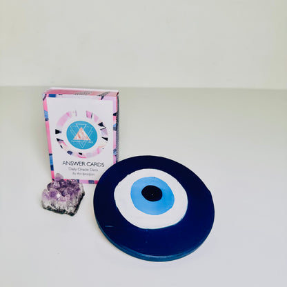 Achk Divine Guardian Number Two blue ceramic evil eye wall art by Ani Ipradjian, a spiritual protection amulet representing resilience, peace and positive energy.