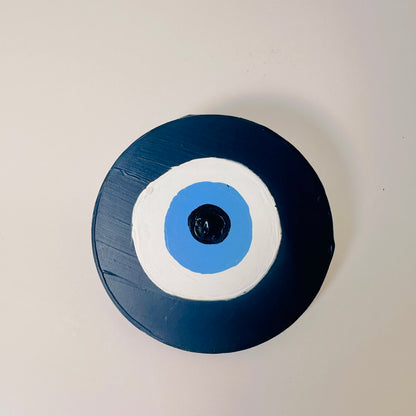 Achk Divine Guardian Number Two dark blue evil eye ceramic amulet by Melbourne artist Ani Ipradjian, a collectible wall hanging representing spiritual strength and protection.