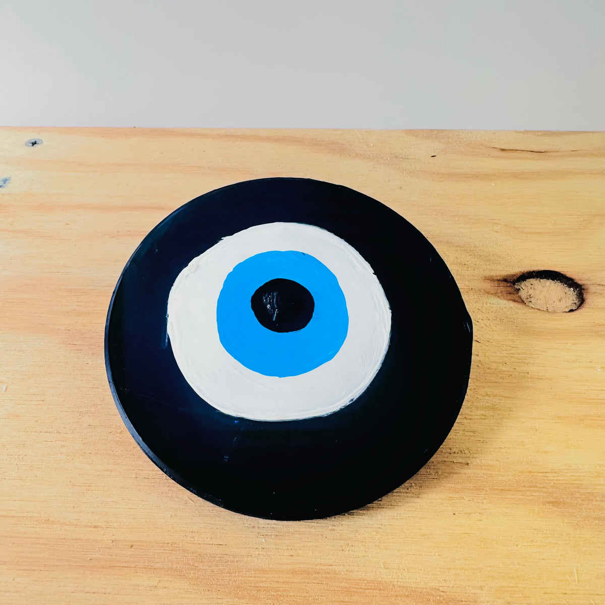 Achk dark blue evil eye protection amulet by Ani Ipradjian, Divine Guardian Number Two ceramic wall art inspired by ancient protective symbolism and wisdom.