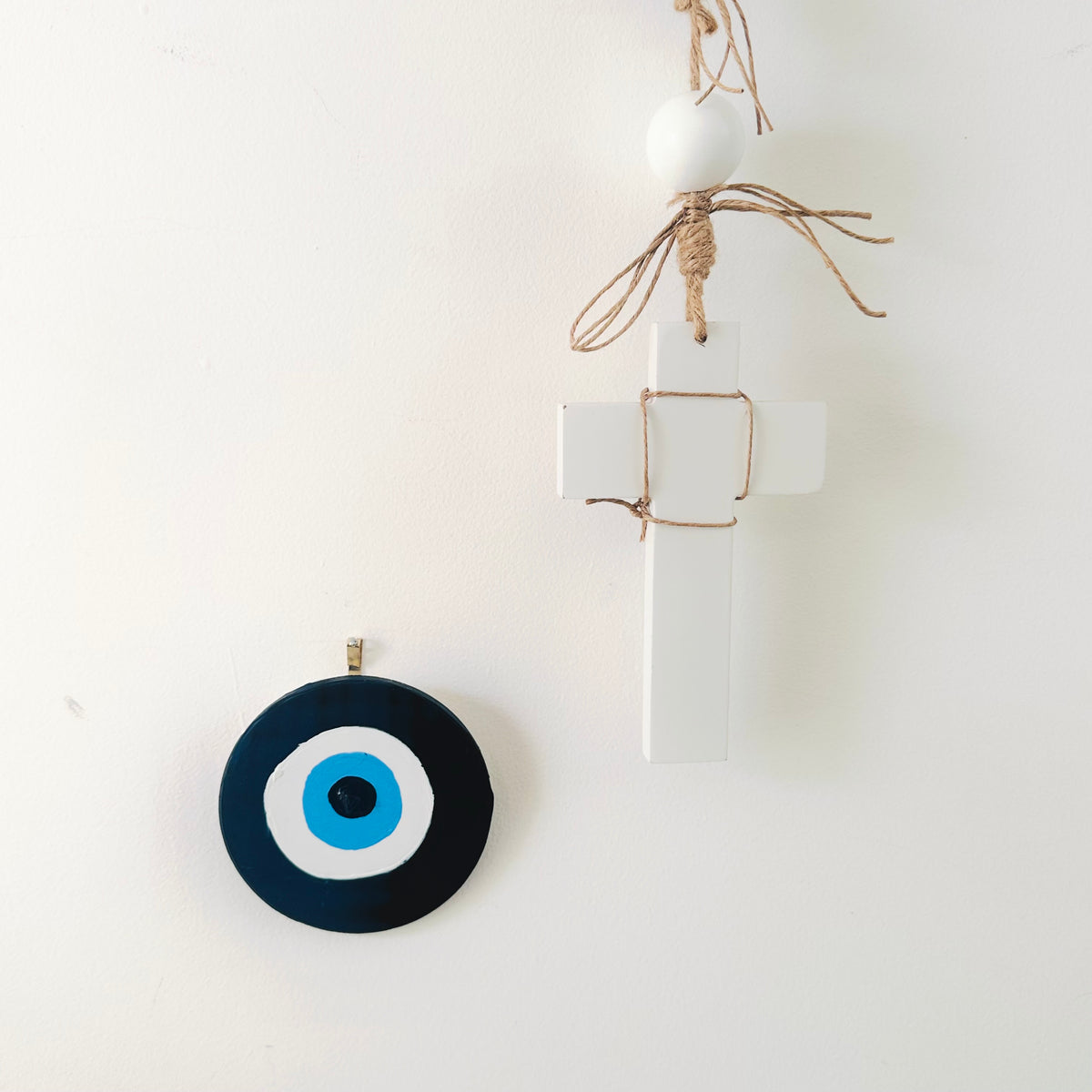 Achk dark blue evil eye wall decoration by Ani Ipradjian, Divine Guardian Number Two hand-painted ceramic artwork inspired by the protective symbolism of the nazar.