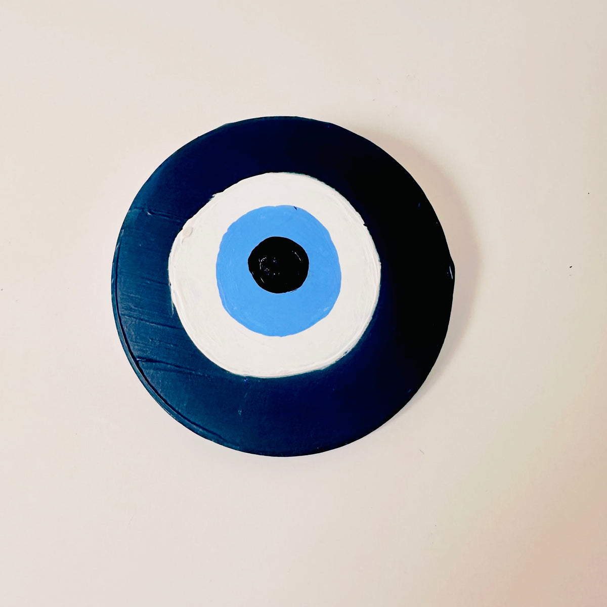 Dark blue Achk evil eye ceramic wall hanging by Ani Ipradjian, Divine Guardian Number Two spiritual protection artwork for the home, family and loved ones.