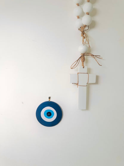 Divine Guardian Number Two hand-painted dark blue ceramic evil eye by Ani Ipradjian, an Achk wall hanging symbolising protection against gossip and negative intentions.