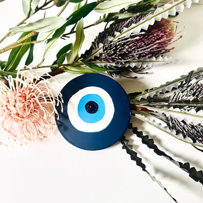Divine Guardian Number Two hand-painted dark blue evil eye ceramic amulet by Australian artist Ani Ipradjian, from the Achk spiritual protection collection.