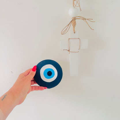 Hand-painted dark blue ceramic evil eye wall art by Melbourne artist Ani Ipradjian, an Achk Divine Guardian Number Two amulet representing spiritual protection.